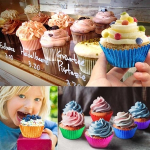 Macro view of assorted metallic foil cupcake liners in vibrant various colors