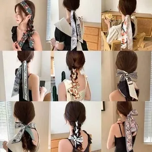 Detail showcasing nine styles of silk hair scarves with elegant prints and floral patterns