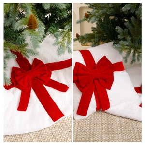 White faux fur Christmas tree skirt with red velvet bows for holiday home decoration