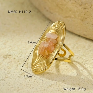 Detail view of oval gold ring with pink stones showing dimensions 3.6cm and 6.0g weight