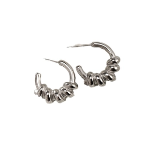 Minimalist silver twisted C-shaped earrings with a polished metallic spiral design