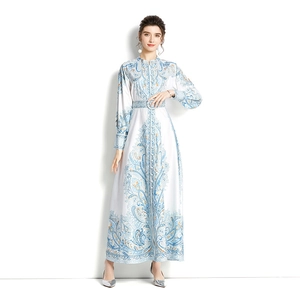 Elegant paisley print maxi dress with stand collar and long sleeves with matching belt