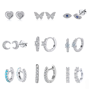 Detailed collection of S925 sterling silver studs with heart, moon, and butterfly motifs