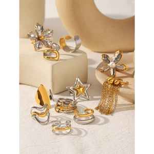 Minimalist gold and silver stainless steel rings and earrings set with pearl accents