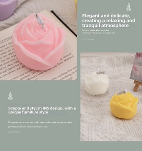 Detailed close-up of rose-shaped scented candles in pink, yellow, and white colors