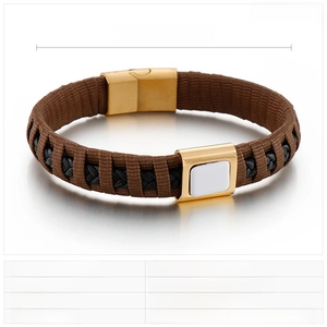 Detail view of brown and black braided leather bracelet with gold stainless steel clasp