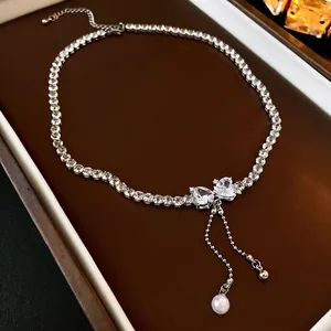 Elegant silver heart bow necklace with zircon fringe and pearls for women's fashion