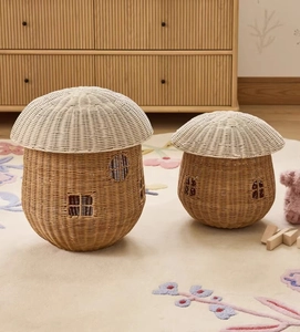 Close-up of woven rattan mushroom baskets in two sizes for children bedroom decor