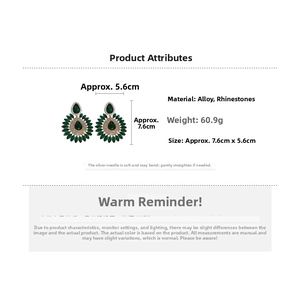 Detail view of large teardrop earrings with green rhinestones and size specifications