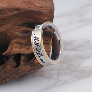 Two-tone stainless steel ring with My Love engraving and a square zircon on wood