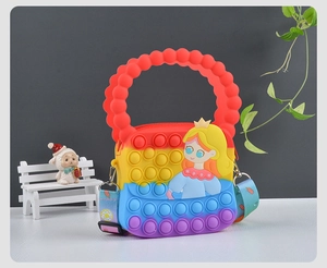 Detail of colorful princess silicone pop-it shoulder bag with adjustable donut strap