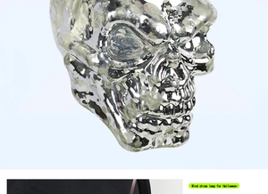 Close-up of silver skull wind chime with electroplated finish for Halloween decor