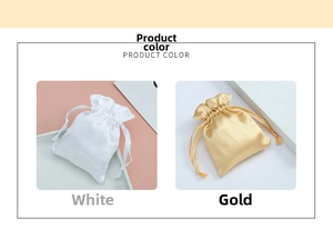 Detail view of smooth white and gold satin drawstring jewelry pouches on display pedestals