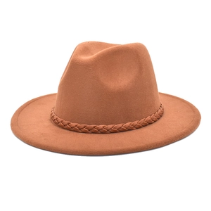 Close-up of brown wool fedora hat featuring a classic braided decorative band