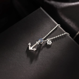 Ocean style S925 sterling silver anchor and rudder necklace with blue zircon accents