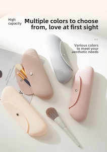 Silicone makeup brush storage bag detail view, portable travel pouch for cosmetics, pastel color.