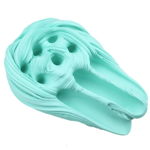 Detailed texture of soft light blue butter slime showing finger indentations for stress relief