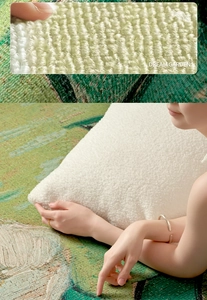 Detailed close-up of soft white teddy velvet pillow fabric with grainy texture macro view
