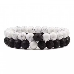 Detail view of 8mm lava stone and white turquoise beaded bracelets for couples