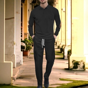 Men's black long sleeve polo set with cargo pants and textured knit fabric in casual outdoor view
