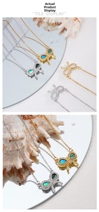 Detail of butterfly necklace with abalone shell inlay and pavé zircon stones on chain