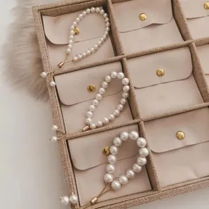 Adjustable gold plated pearl bracelet available in small medium and large bead sizes