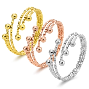 Three-layer stainless steel wrap rings in gold, rose gold and silver with bead ends