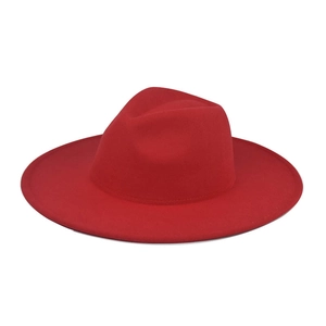 Detailed view of flat brim red wool fedora hat featuring a sturdy felt texture