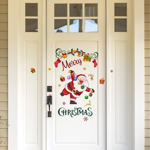 Cartoon Santa Claus and Merry Christmas wall decal displayed on a white wooden door