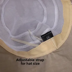 Detail view of khaki sun hat featuring breathable white mesh lining and adjustable drawstring
