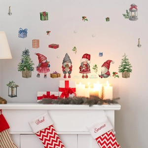 Christmas wall stickers with cartoon gnomes and decorated tree above a cozy fireplace