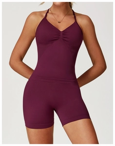 Detail view of seamless dark purple sports vest with shirred neckline and smooth texture