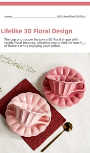 Top view of floral ceramic coffee cup and saucer set with relief petal textures and gold spoon