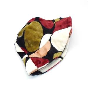 Plush coral fleece bucket hat with colorful geometric dots for winter warmth