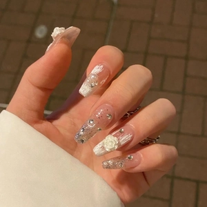 3D white camellia and pearl nail charms on long ballerina pink glitter press-on nails