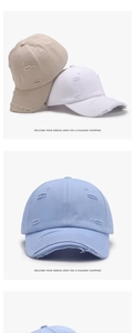 Detailed view of distressed edges and ripped texture on cotton baseball caps
