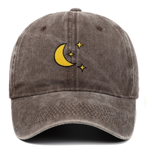 Detail of moon and stars embroidery on vintage washed cotton baseball cap