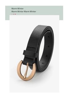 Detailed close-up of a black leather belt with a golden round pin buckle and fine stitching