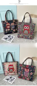 Detail of embroidered owl patterns on jacquard woven canvas tote bags in four colors