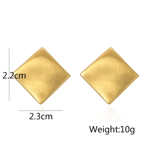 Macro view of gold geometric square stud earrings showing dimensions 2.2cm by 2.3cm
