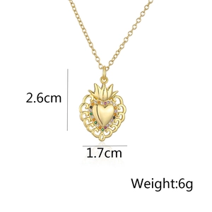 Macro detail of heart pendant dimensions showing 2.6cm height and 1.7cm width measurements