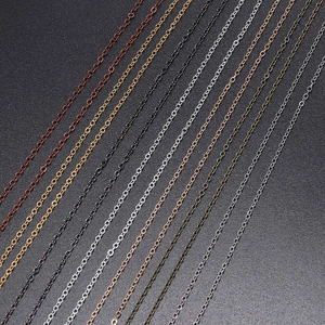Detailed close-up of plated metal cross chains in various metallic colors for DIY jewelry