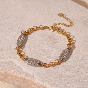 Bracciale geometrico bicolore in acciaio inossidabile con strass bianchi brillanti