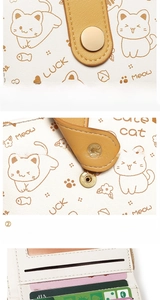 Detail view of cute cat wallet showing secure snap button closure and multi-card slots