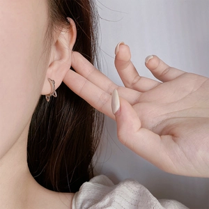 Cute cat-ear shaped silver hoop earrings for women, minimalist and dainty jewelry style