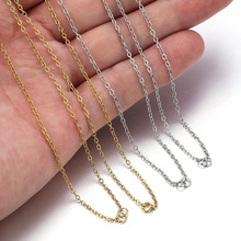 Macro detail of fine gold and silver stainless steel chains for DIY jewelry making