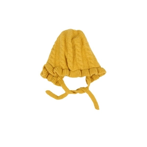 Infant baby knitted bonnet with cable pattern and ruffle brim in ginger yellow color