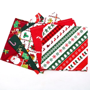 Set of Christmas cotton dog bandanas featuring reindeer and Santa Claus festive patterns