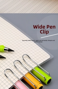 Detail of inkless eternal pencils in pink, yellow, and green with wide metal clips