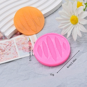 Pink and orange angel feather silicone molds for DIY chocolate fondant cake baking